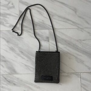 Karl Lagerfeld Black Crossbody Bag with rhinestones on the outside of the bag